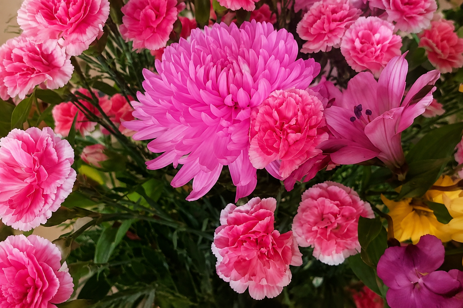 A welcoming arrangement of pink flowers